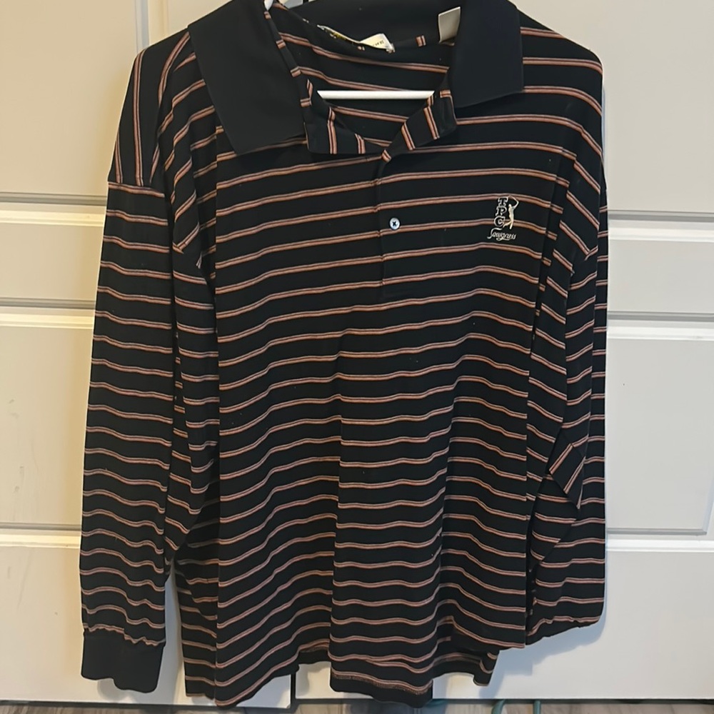 Polo-Black with orange stripes.